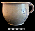 North American salt glazed stoneware chamberpot, painted cobalt. Rim diameter: 7.75”, Base diameter: 5.00”, Vessel height: 6.00”.Lot: No lot number. 18BC38